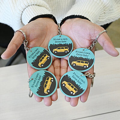 Its Not a Race, Drive Safe Keyring (Macaw Blue Green)
